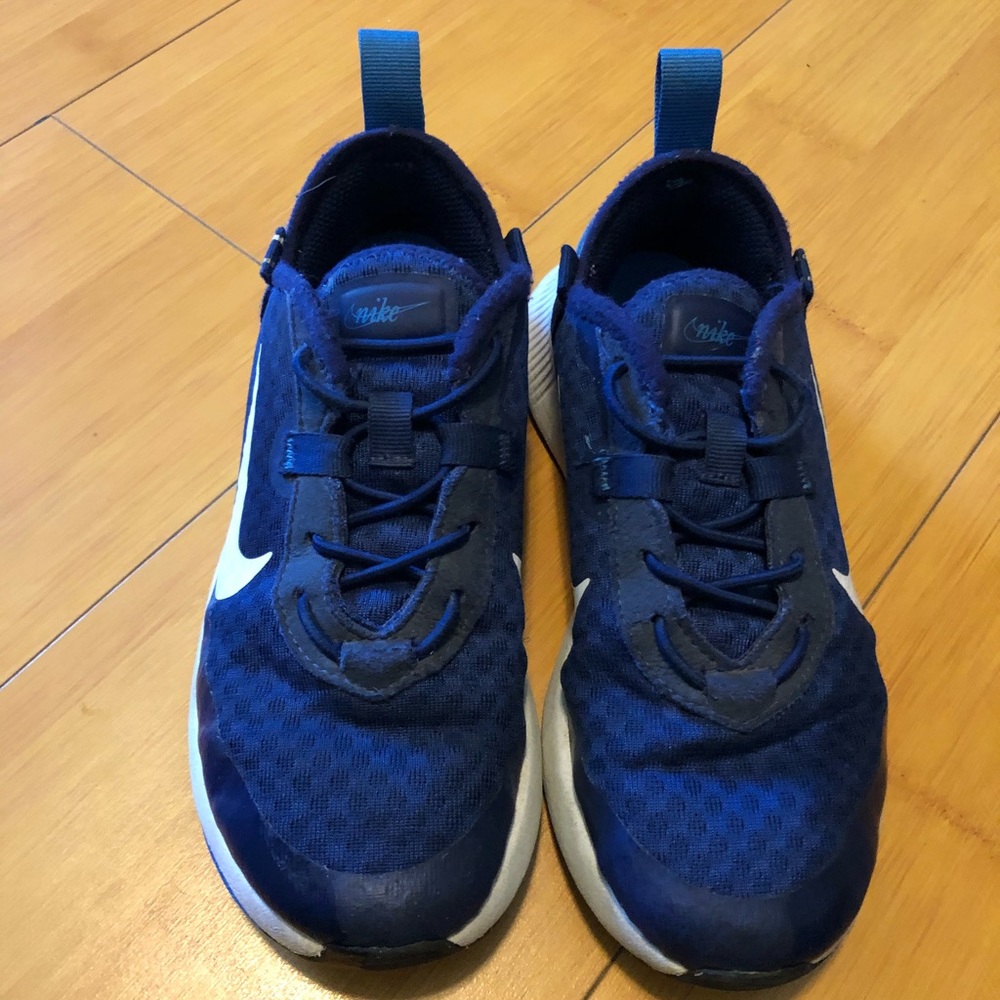 Nike boys shoe size 12. Barely worn. Elastic laces for easy slide on